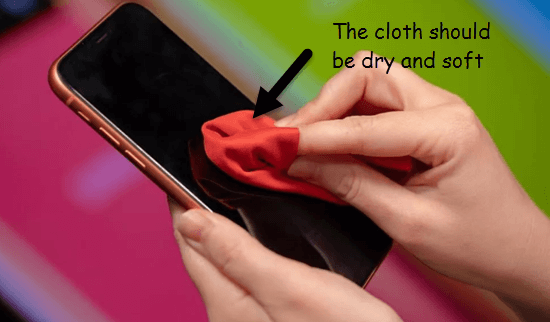 Wipe down the iPhone using a dry and soft cloth